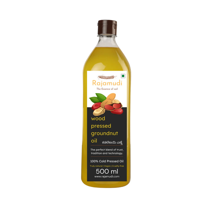 A bottle of Rajamudi Organic Cold-Pressed Groundnut Oil with a graphic background depicting the sourcing and pressing of the oil from groundnuts.