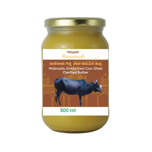 A jar of Malenadu Gidda Clarified Butter, also known as Desi Malendau giida Cow Ghee The jar is 300 ml in size.